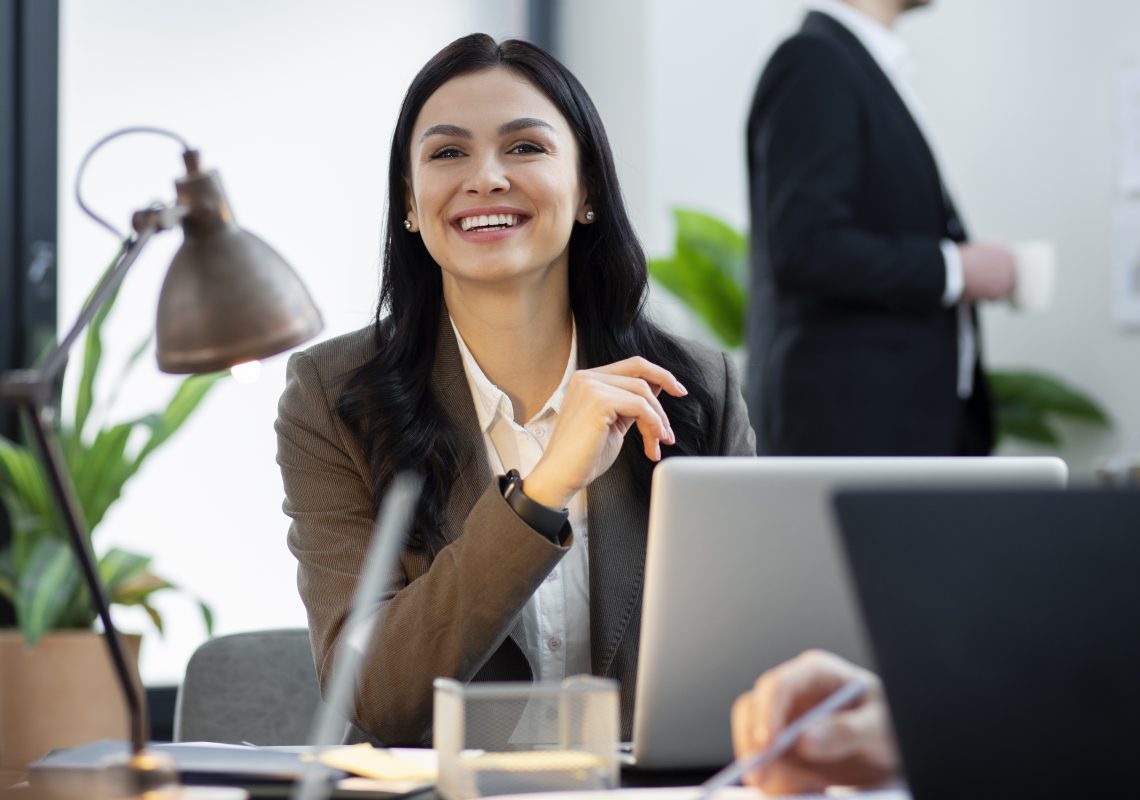 close-up-smiley-woman-working